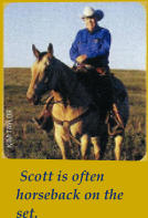 Scott is often horseback on the set.
